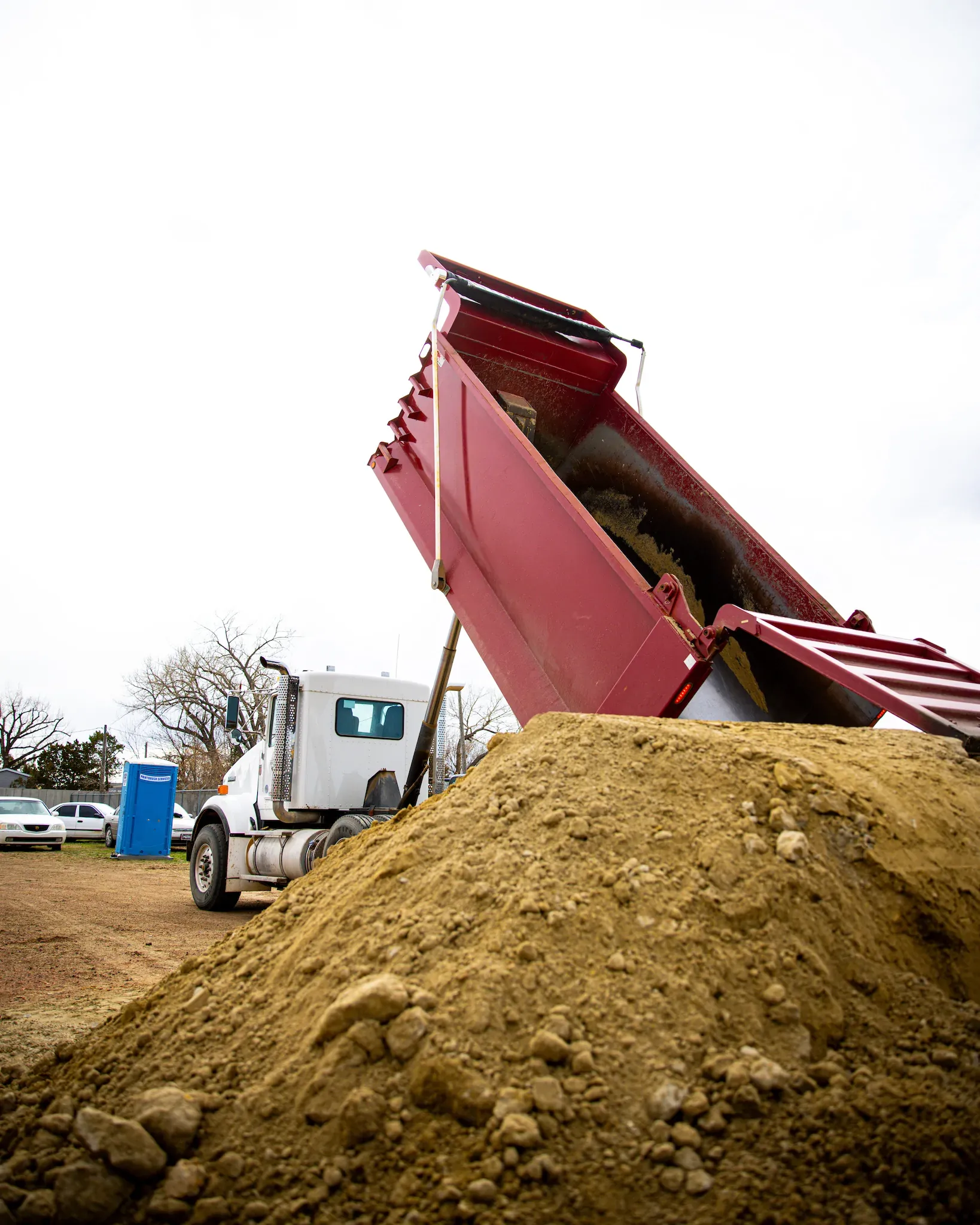 Front loading excavator loading truck